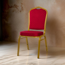 Konferenčná stolička s červeným čalúnením a zlatým rámom.